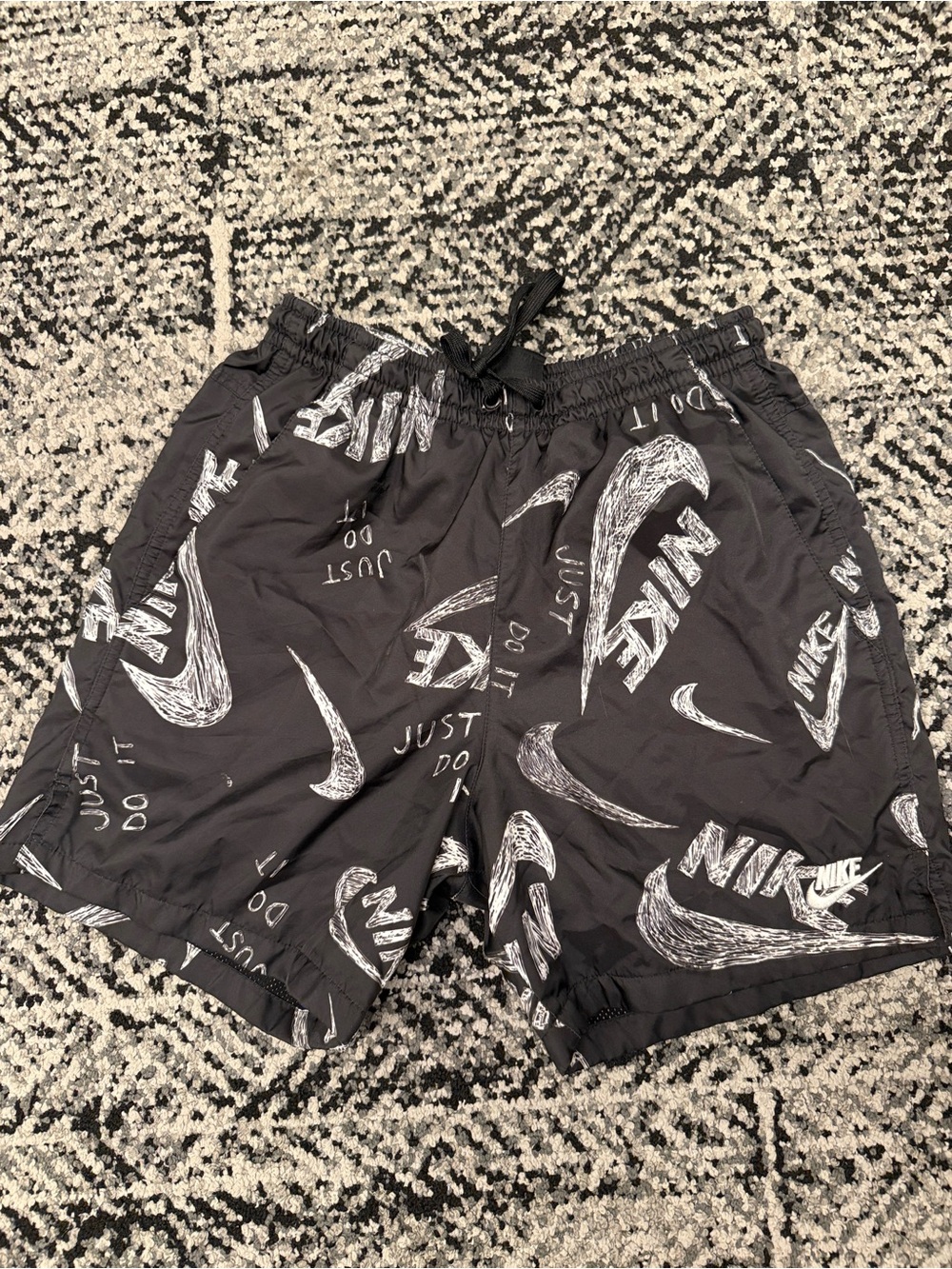 Nike Black Swim Trunks with White Swoosh and Logo Print